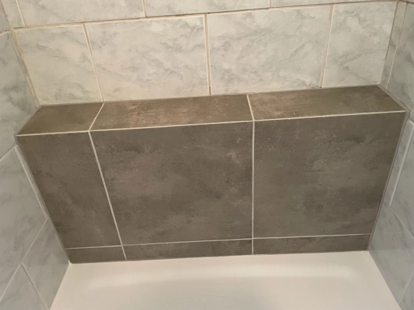 Moderní sprchová baterie a sprchová hlavice